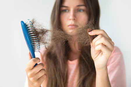 Top 5 Causes of Hair Loss & Expert Solutions | Skinnfit Medspa